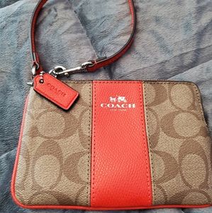 COACH colorblock signature orange wristlet